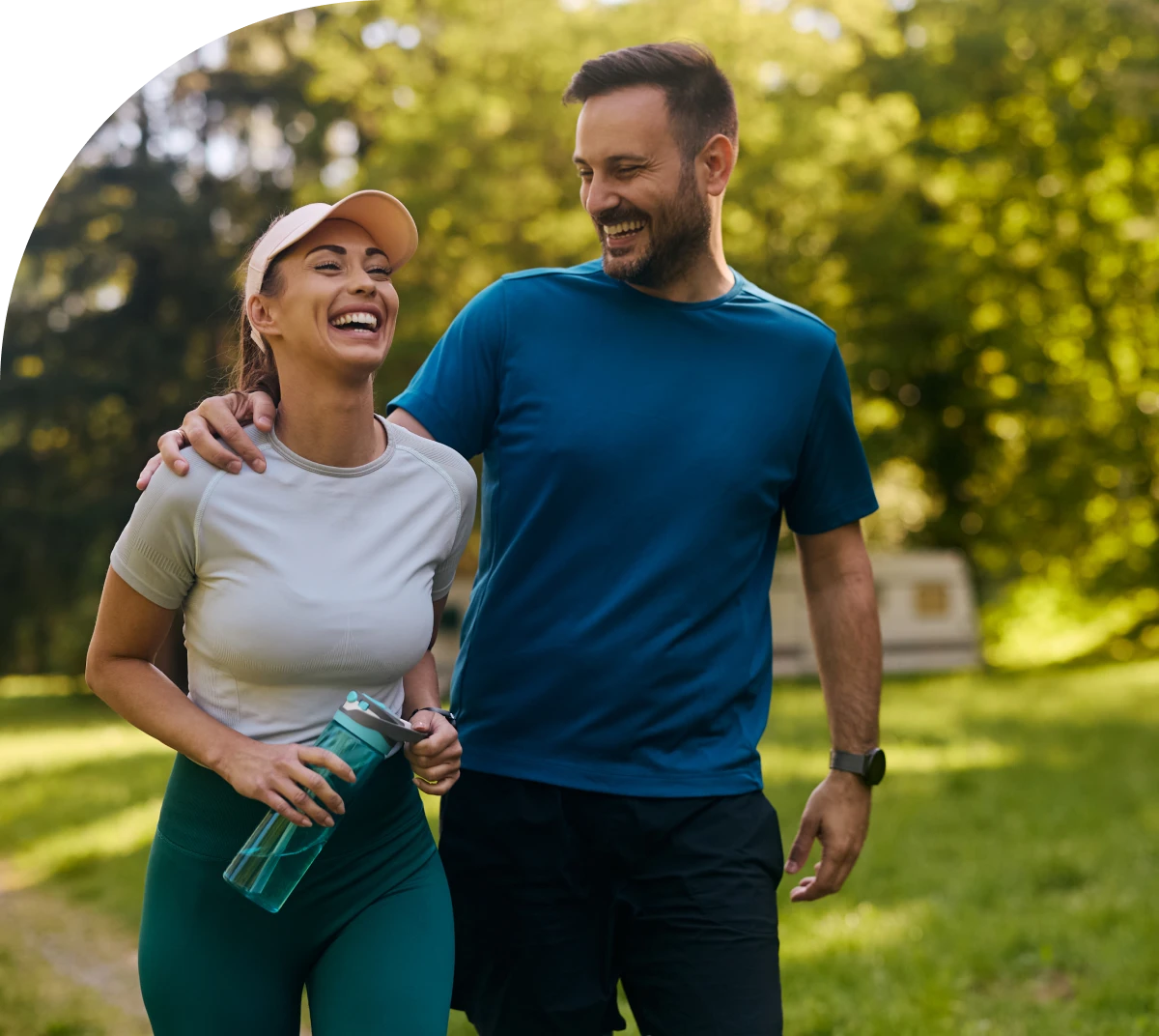 Happy pair jogging in park